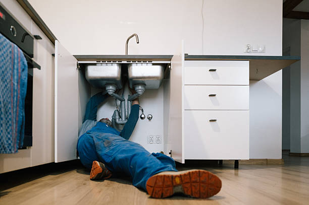 Professional Emergency Plumber technician working in Greenville, IN